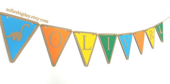 Banner Idea brown white and then green letters with silver dinosaurs